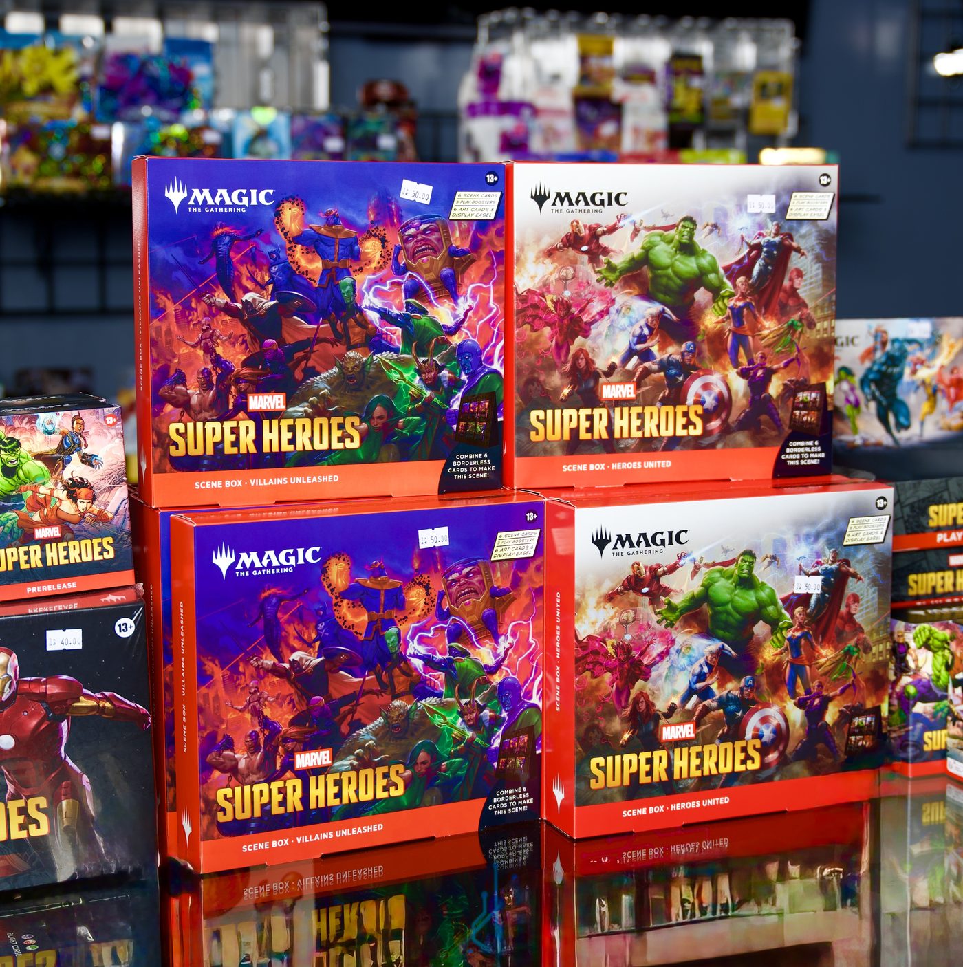 Magic: The Gathering Marvel Super Heroes scene boxes stacked on the counter